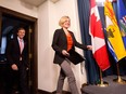 Alberta Premier Rachel Notley and New Brunswick Premier Brian Gallant walk into a press conference after a meeting in Edmonton on Thursday, Oct.  29, 2015.