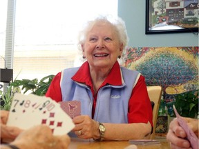 Christina Ryan, Calgary Ruby Friesen plays cribbage with her friends at Silvera for Seniors in Calgary.