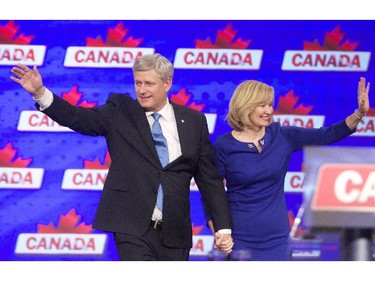 Stephen Harper and his wife Laureen take the stage for his concession speech at Conservative headquarters Monday night October 19, 2015 after his government went down to defeat.