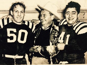 Paul Rowe, 50, with team president Tom Brook, centre, and head coach Les Lear, 41, after winning 1948 Grey Cup game, 12-7 over Ottawa. For story on Paul Rowe being inducted into another Hall of Fame.