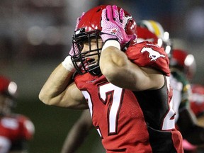 Calgary Stampeders Jeff Hecht reacted to the Edmonton Eskimos intercepting a play during their game at McMahon Stadium in Calgary on October 10, 2015 .