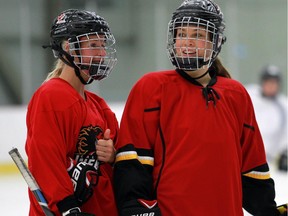 Bailey Bram, left, and Rebecca Johnstone, on the ice at the Calgary Inferno training camp at WinSport Arenas Sunday, October 5, 2015.