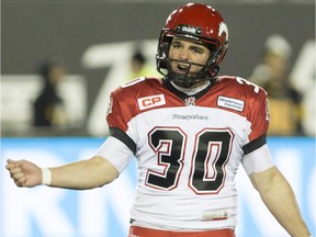 Calgary Stampeders kicker Rene Paredes (30) celebrates after making an end-of-game winning field goal to defeat the Hamilton Tiger-Cats 23-20 in Hamilton, Ontario on Friday, October 2, 2015.