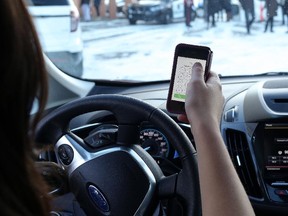As of Jan. 1, 2016,  the penalty for distracted driving is a $287 fine and three demerit points. (File photo from Oct. 26, 2015)