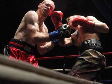 Brian Samuel from Red Deer, left, fights Brett Enns from Calgary at the Dekada Premier Fight Night at the Genesis Centre on October 16, 2015.