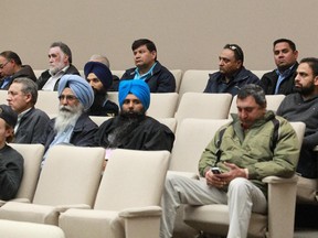 About 30 Calgary cab drivers attended council while councillors debated new limo and sedan rules on Monday Oct. 5, 2015.
