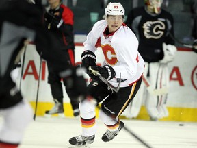 Calgary Flames centre Sam Bennett runs through drills during practice on Wednesday.
