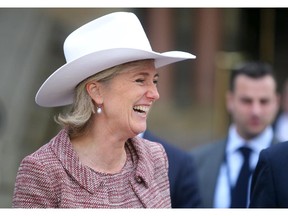 Princess Astrid of Belgium wears her white Smithbilt hat following a ceremony at Calgary's Old City Hall on Oct. 29, 2015.