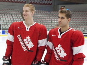 Brothers Doug, left, and Freddie Hamilton played together on Team Canada's world junior squad at the Calgary and Edmonton-hosted 2012 IIHF World Junior Hockey Championships. They may one day play together on the Calgary Flames after Freddie was acquired by the organization on Sunday.