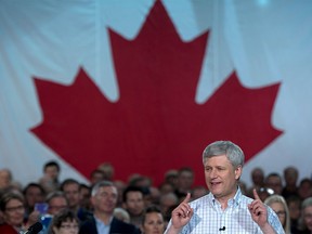 Conservative Leader Stephen Harper addresses a gathering during a campaign event in Fredericton, N.B. Friday, Oct. 16, 2015.