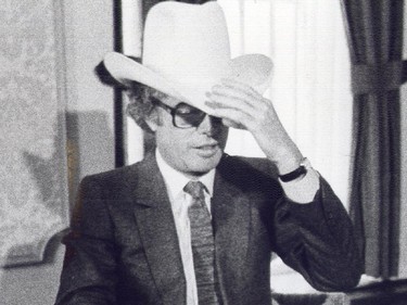 File Photo,  CALGARY, Alberta: December 06, 2012 -- Former Canadian Ambassador Ken Taylor receives a white hat in Calgary on Feb. 11, 1980. File Photo,  (For City section story by ) Calgary Herald