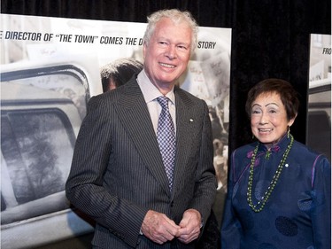 Former Canadian Ambassador Ken Taylor and his wife Pat, pose for photographers at the premiere of the film Argo in Washington, Wednesday, Oct. 10, 2012. Argo is based on covert operation to rescue six Americans during the Iran hostage crisis in 1979.