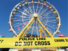 A large section of the Calgary Stampede Midway was closed as police investigated a stabbing that took place . (Gavin Young/Calgary Herald)