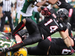 Running back Matt Walter, seen moving the ball during the first half of the Labour Day Classic last month, will start for the Stamps on Saturday against Toronto.