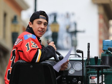 Calgary Flames forward Johnny Gaudreau asks the crowd Flames trivia questions after driving a Zamboni down Stephen Avenue Mall in downtown Calgary on Tuesday as part of a promotion with Sport Chek to kick off the start of regular season hockey.
(Gavin Young/Calgary Herald)