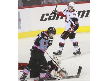 Moose Jaw Warriors' Tanner Jeannot celebrates a goal during game action against the Calgary Hitmen at the Saddledome in Calgary, on October 15, 2015.