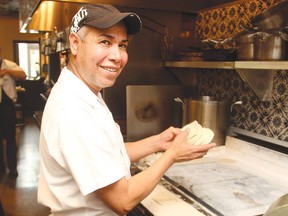 Tortilla maker Jose Lugo at Native Tongues Taqueria honing his craft.