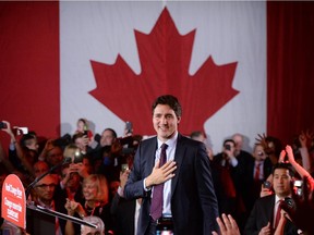 Liberal leader and incoming prime minister Justin Trudeau is seen on stage at Liberal party headquarters in Montreal early Tuesday, Oct. 20, 2015 after winning the 42nd Canadian general election.