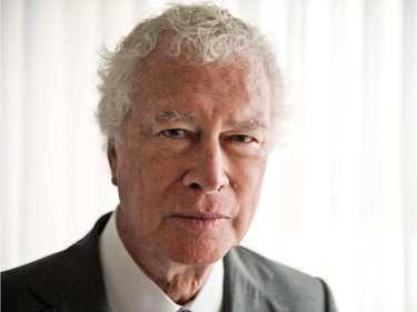 Ken Taylor, former Canadian ambassador to Iran, poses for a photo for the documentary "Our Man in Tehran, " during the 2013 Toronto International Film Festival in Toronto on Thursday, Sept. 12, 2013. Taylor, who sheltered six U.S. citizens during the 1979 Iranian hostage crisis, has died, says a family friend.