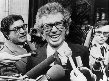 Ken Taylor, Canadian Ambassador to Iran, laughs as he answers questions during a meeting with journalists outside the Canadian Embassy in Paris in this Jan. 31, 1980 file photo. Taylor, who sheltered six U.S. citizens during the 1979 Iranian hostage crisis, has died, says a family friend. THE CANADIAN PRESS/AP