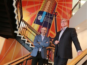 John Vos, operations manager at Corus radio Calgary, left, and Garry McKenzie, general manager for Corus Radio Alberta, in Corus's new 17th Avenue office and studios.