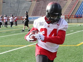 Calgary Stampeders rookie Tory Harrison works during practice on Monday.