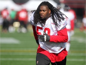 New Calgary Stampeders offensive lineman Randy Richards ran through plays during practice at McMahon Stadium on Wednesday.