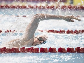 A swimmer cuts through in a lane at the 2015 Parapan Am Games in Toronto this summer. Closer to home, a reader says adults at a Calgary pool make kids feel unwelcome at free session time when they use the lanes.