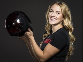 Skeleton racer Madison Charney will wear a helmet modelled after the ones her favourite team wears. She will suit up with Stampeders headgear this year.