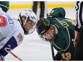 Team BC player Eli Zummack takes a faceoff against Saskatchewan forward Tyler Lees, a Kootenay Ice prospect at the Western Canada U16 Challenge Cup at WinSport’s Markin MacPhail Centre.