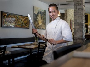 Dennis Tan, executive chef at D'vine Diner located on Elbow Dr. SW, and also the artwork and tabletop creator, photographed on location in Calgary.