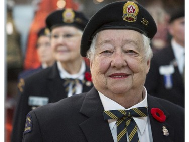 Margaret Tierney, president Royal Canadian Legion Ladies Auxilary, stands in line at the beginning of the poppy fund launch parade at Chinook Mall in Calgary, on October 31, 2015.