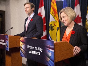 Premier Rachel Notley and New Brunswick Premier Brian Gallant speak with media after a meeting in Edmonton on Thursday.