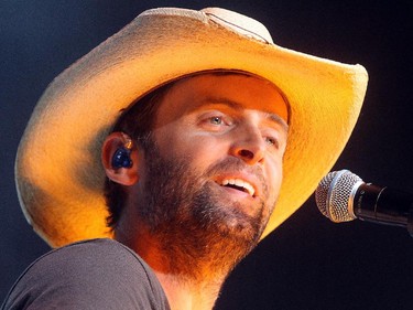 Dean Brody performs on the Road Trip double bill at the Saddledome Friday night October 2, 2015. He opened for Paul Brandt.