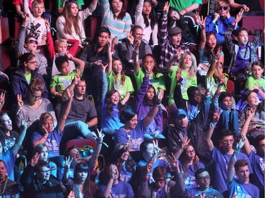 Young crowd members cheered as rap artist Kardinal Offishall spoke to the crowd during WE Day in Calgary at the Scotiabank Saddledome on October 27, 2015.