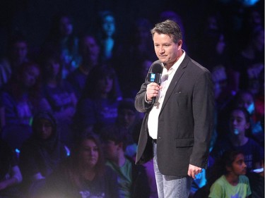Calgary Herald Editor Lorne Motley spoke to the crowd during WE Day in Calgary at the Scotiabank Saddledome on October 27, 2015.