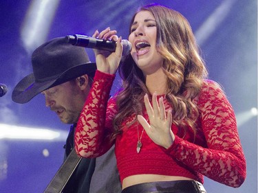 Jess Moskaluke performs with Paul Brandt Friday night October 2, 2015 at the Saddledome as part of the Road Trip with Dean Brody.