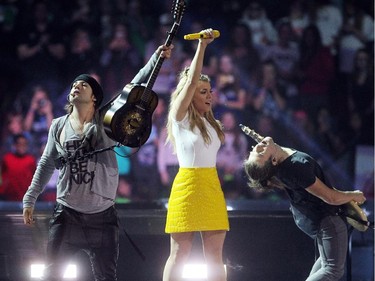 Members of the Band Perry performed to the crowd during WE Day in Calgary at the Scotiabank Saddledome on October 27, 2015.