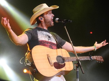 Dean Brody performs on the Canadian Road Trip at the Saddledome Friday night October 2, 2015. He opened for Paul Brandt.