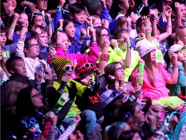 Young participants signed along with Academy Award winning actress and social activist Marlee Matlin during her message of hope and courage to the crowd during WE Day in Calgary at the Scotiabank Saddledome on October 27, 2015.