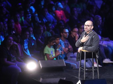 Free the Children ambassador and author Spencer West spoke to the crowd during WE Day in Calgary at the Scotiabank Saddledome on October 27, 2015. (Colleen De Neve/Calgary Herald)