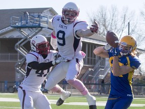 Calgary Colts defender Owen Redick knocks away a pass intended for Saskatoon Hilltops receiver Tyson Sawatsky during the Prairie Football Conference final in Saskatoon on Sunday.