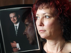 Sparla McCann holds a photograph of her late son Rory at home on Wednesday, Oct. 28, 2015. He died of a fentanyl overdose this year at the age of 19. She says naloxone, an antidote that reverses the effects of opioid overdoses, could have saved her son's life.