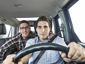 Shmuel, at the wheel, and Sholom Hoffman. The Calgary brothers are contestants of Season 11 of Canada's Worst Driver.  Courtesy, Discovery.