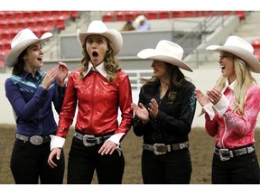 Maggie Shortt, second from left, reacts to being called as the new 2016 Stampede Queen.  Pictured with her are the other a few of the other competitors, Katie Maclead, left, Kate Campbell, and Meagan Peters.