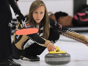 Skip Rachel Homan lines up her shot during a game against Team Lawton during Day 1 of the Autumn Gold Curling Classic at the Calgary Curling Club on Friday Oct. 9, 2015.
