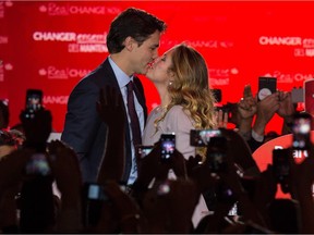 Newly elected prime minister Justin Trudeau kisses his wife, Sophie, in Montreal.