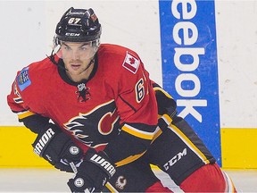 Michael Frolik has been bumped up to the Johnny Gaudreau and Sean Monahan line as the Flames search for the right mix to ignite their scoring punch.