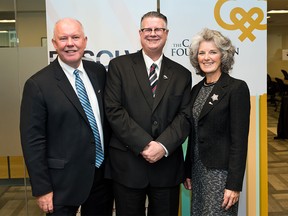 From left, Alan Norris, chairman of the Resolve Campaign; Bob Patrick, a Resolve beneficiary; and Eva Friesen, CEO of the Calgary Foundation; during the Vital Signs press conference on Tuesday, Oct. 6, 2015.