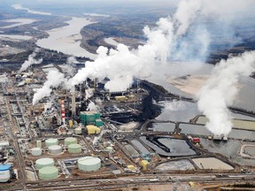 The aerial view shows the Suncor oilsands extraction facility near Fort McMurray, Alta.